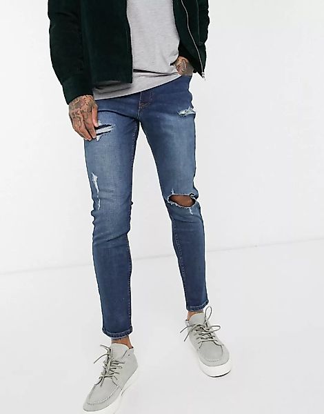 New Look – Skinny-Jeans in mittlerer Waschung mit Flickendesign-Blau günstig online kaufen