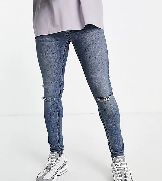 COLLUSION x001 – Sehr enge Jeans in verwaschenem Mittelblau mit Knierissen günstig online kaufen