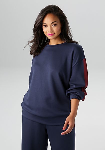 Aniston PLUS Sweatshirt mit trendigen Seitenstreifen günstig online kaufen