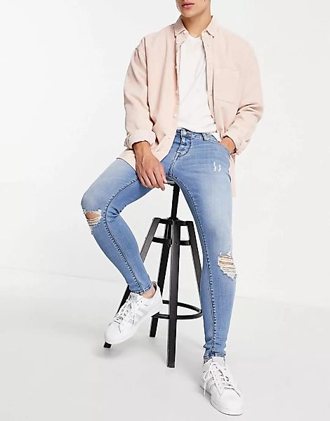 ASOS DESIGN – Hautenge Jeans in heller Waschung mit Power-Stretch und Zierr günstig online kaufen
