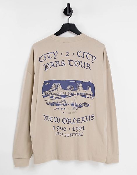 ASOS DESIGN – Langärmliges Oversize-Shirt in Beige mit „New Orleans“-Print günstig online kaufen