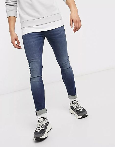ASOS DESIGN – Superenge Skinny-Jeans in dunkelblauer Waschung günstig online kaufen