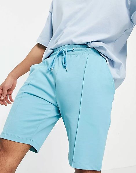 ASOS DESIGN – Jersey-Shorts in engem Schnitt mit Ziernähten in Blau günstig online kaufen