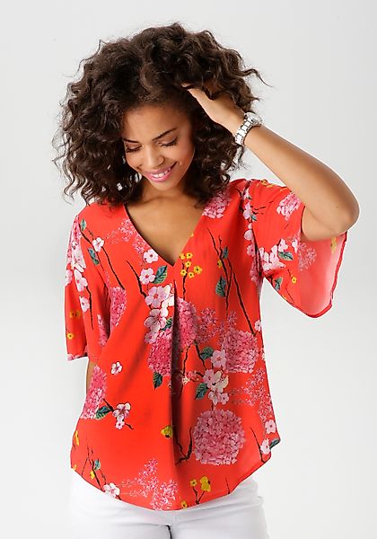 Aniston CASUAL Schlupfbluse, mit farbharmonischem Blumendruck günstig online kaufen