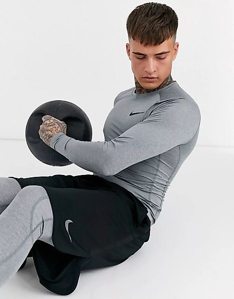 Nike – Pro Training – Langärmliges, leichtes Oberteil in Grau günstig online kaufen
