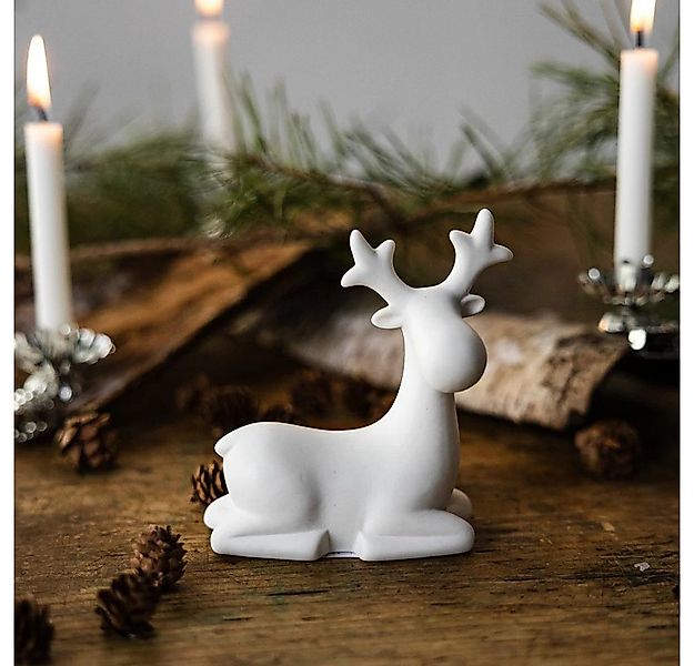 Storefactory Dekoobjekt Rentier Sten Weihnachtsdeko Liegend aus Keramik Wei günstig online kaufen