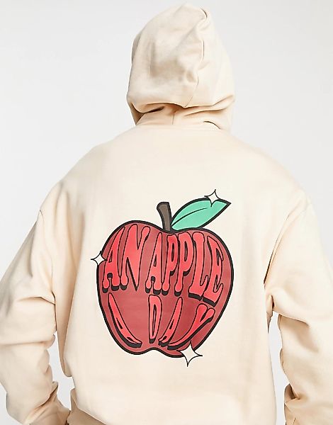 ASOS DESIGN – Oversize-Kapuzenpullover in Beige mit Apfel-Cartoonprint am R günstig online kaufen