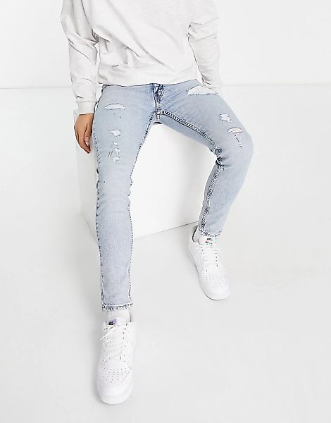 Levi's – 519 – Jeans in verwaschenem Grau mit superengem Schnitt günstig online kaufen
