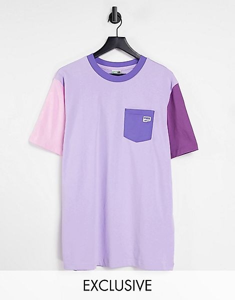 Puma – Downtown – T-Shirt in Lila-Bunt mit Tasche günstig online kaufen