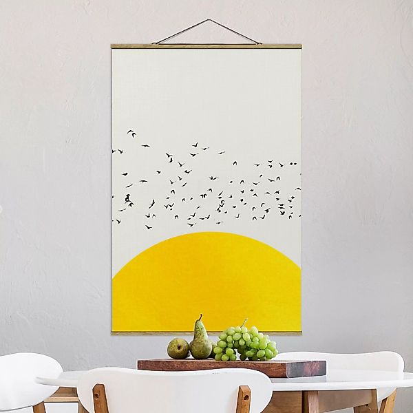 Stoffbild mit Posterleisten Vogelschwarm vor gelber Sonne günstig online kaufen