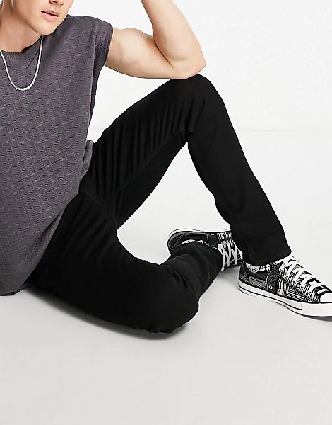 AllSaints – Rex – Jeans mit schmalem Schnitt in Schwarz günstig online kaufen