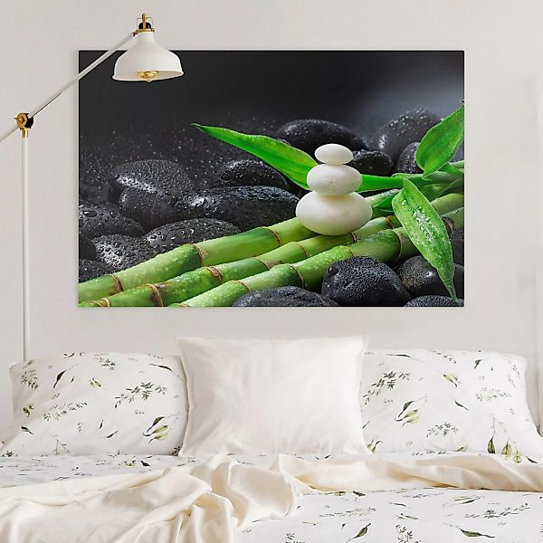 Leinwandbild Weiße Steine auf Bambus günstig online kaufen