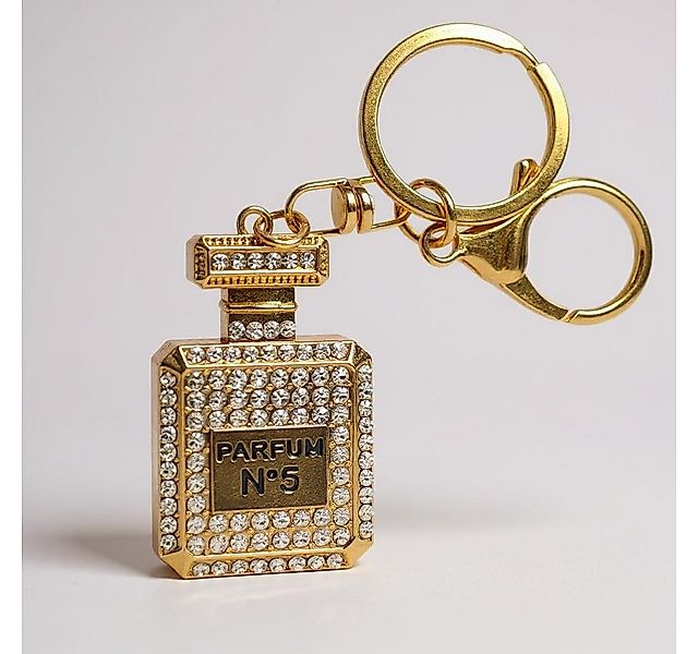 what the shop Schlüsselanhänger Taschenanhänger Parfum Look Gold mit Krista günstig online kaufen