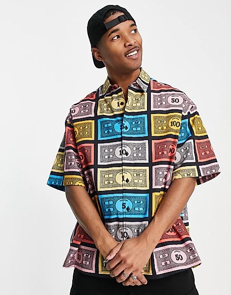 ASOS DESIGN – Kastig geschnittenes Oversize-Hemd mit Monopoly-Geldschein-Au günstig online kaufen