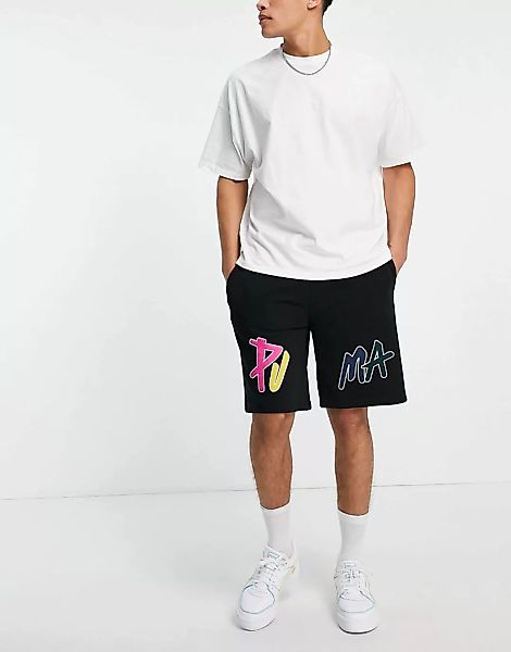 Puma – Skate – Kastige Shorts in Schwarz mit buntem Logo günstig online kaufen