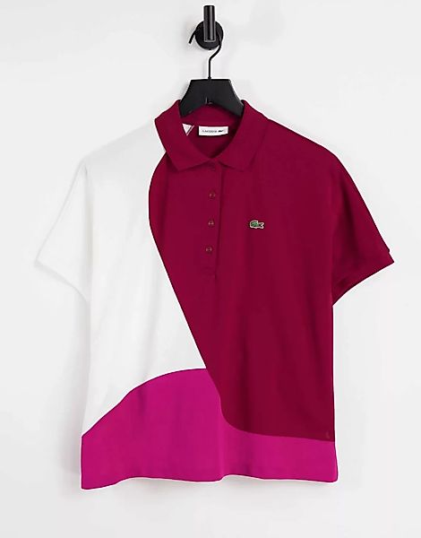 Lacoste – Polohemd in Rosa mit Blockfarbendesign günstig online kaufen