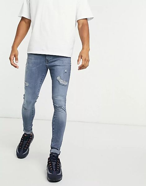 River Island – Spray-on-Jeans in Mittelblau günstig online kaufen