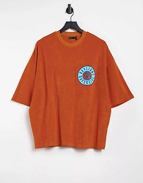 ASOS Daysocial – Oversize-T-Shirt mit Aufnäher aus Frottee in Orange günstig online kaufen