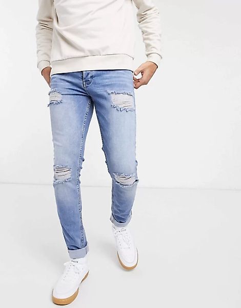 ASOS DESIGN – Eng geschnittene Jeans aus Bio-Baumwollmix in verwaschenem Mi günstig online kaufen