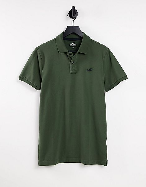Hollister – Schmal geschnittenes Poloshirt in Olivgrün mit Logo günstig online kaufen