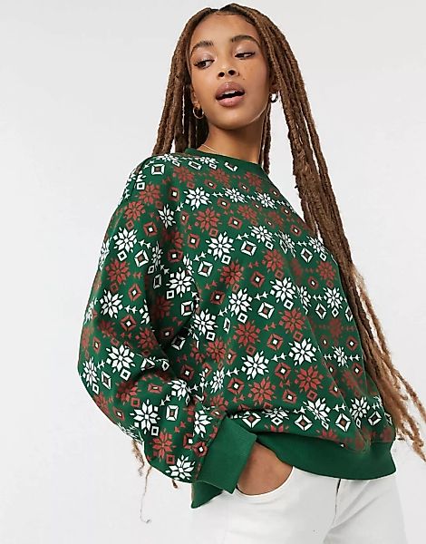 Monki – Nana – Weihnachts-Sweatshirt in Grün aus Bio-Baumwollmischung mit N günstig online kaufen
