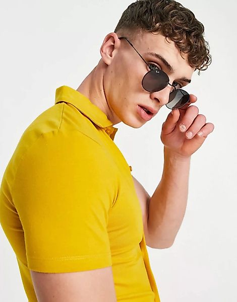 ASOS DESIGN – Jersey-Hemd aus Bio-Baumwolle mit Knopfleiste in Gelb günstig online kaufen