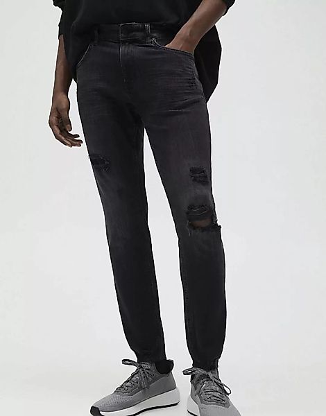 Pull&Bear – Eng geschnittene Premium-Jeans in Schwarz mit Zierrissen günstig online kaufen