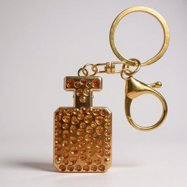what the shop Schlüsselanhänger Taschenanhänger Parfum günstig online kaufen