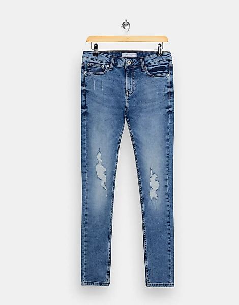 Topman – Hautenge Jeans aus Bio-Baumwollmix mit Zierrissen in mittelblauer günstig online kaufen