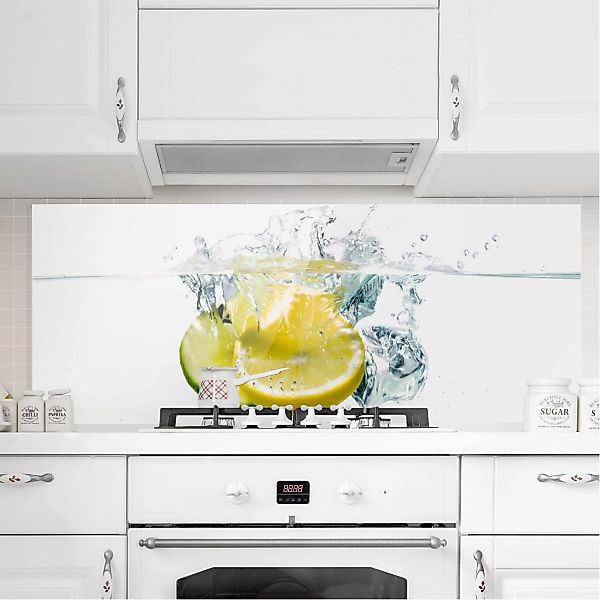 Glas Spritzschutz Gemüse & Obst - Panorama Zitrone und Limette im Wasser günstig online kaufen