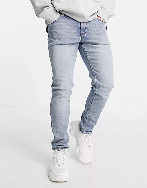 ASOS DESIGN – Schmale Stretch-Jeans mit getönter, hellblauer Waschung günstig online kaufen