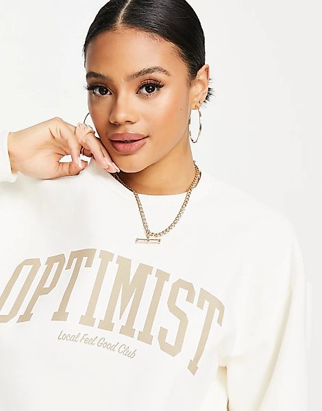 NA-KD X Anna Briand – Oversize-Sweatshirt in gebrochenem Weiß mit „Optimist günstig online kaufen
