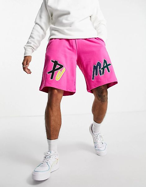Puma – Skate – Kastige Shorts in Rosa mit buntem Logo günstig online kaufen