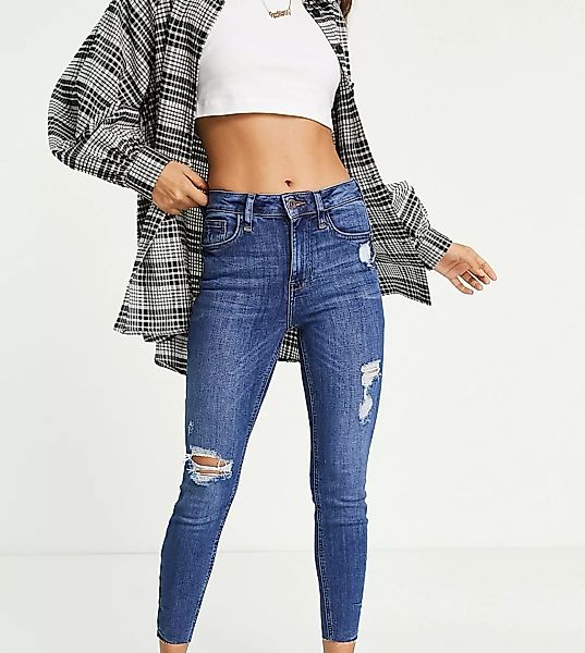 River Island Petite – Zerrissene Jeans mit engem Schnitt, unbehandeltem Sau günstig online kaufen