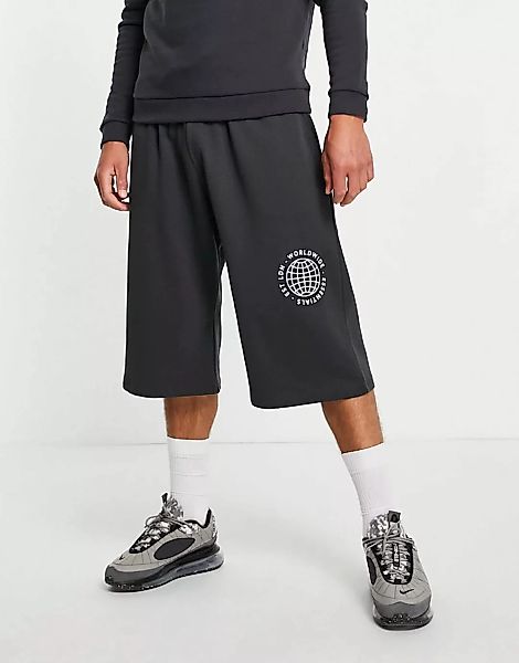 ASOS DESIGN – Oversize-Shorts aus Jersey mit Worldwide-Print in Schwarz, Ko günstig online kaufen
