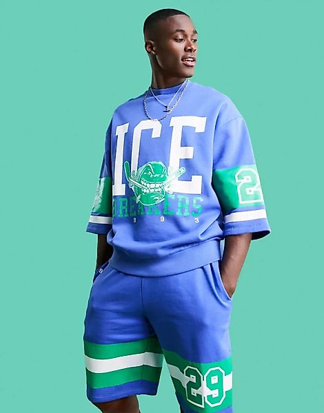 ASOS DESIGN – Kurzärmliges Oversize-Sweatshirt in Blau mit großem Sportprin günstig online kaufen