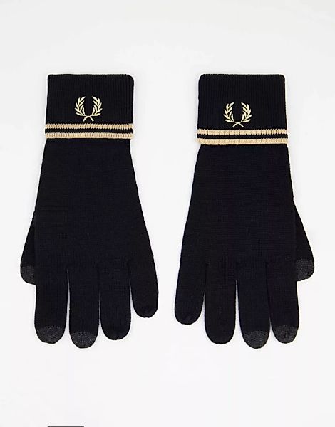 Fred Perry – Handschuhe aus Merinowolle in Schwarz/Gold mit zwei Zierstreif günstig online kaufen