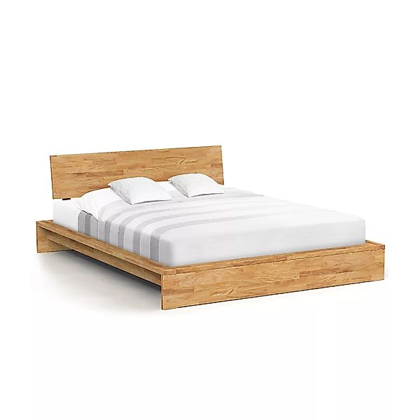 Bett CUBIC mit durchgehenden Holzkopfteil Holz massiv günstig online kaufen
