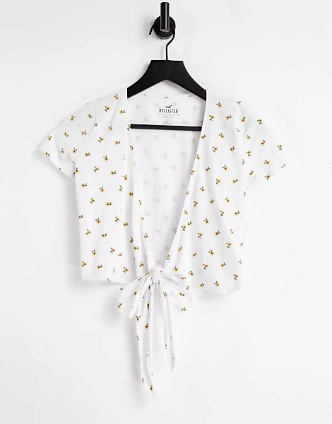 Hollister – Weiß geblümtes T-Shirt im Wickeldesign mit Bindedetail an der V günstig online kaufen