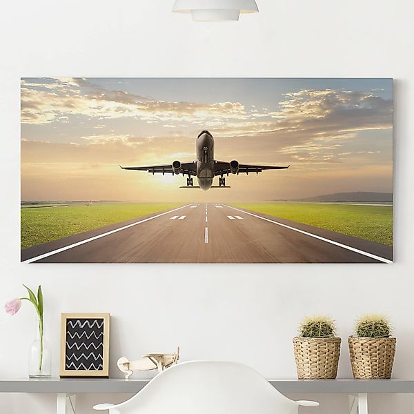 Leinwandbild - Querformat Startendes Flugzeug günstig online kaufen