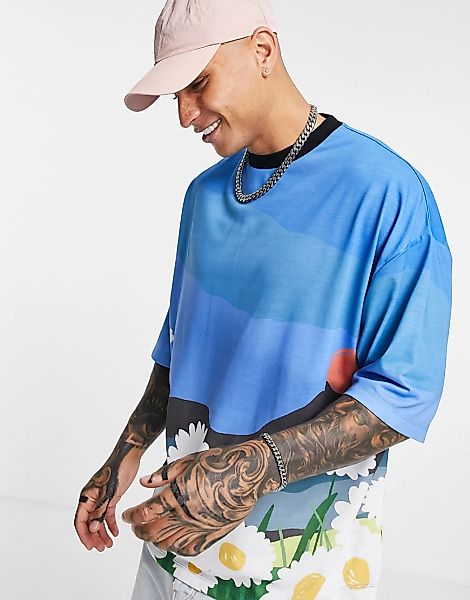 ASOS DESIGN – Durchgehend bedrucktes Oversize-T-Shirt in Blau günstig online kaufen
