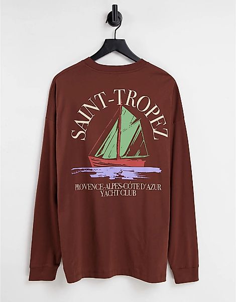 ASOS DESIGN – Langärmliges Oversize-Shirt in Braun mit „Saint-Tropez“-Print günstig online kaufen