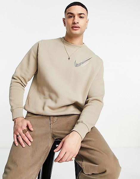 Nike – Sweatshirt in Beige mit Logo auf der Brust-Neutral günstig online kaufen