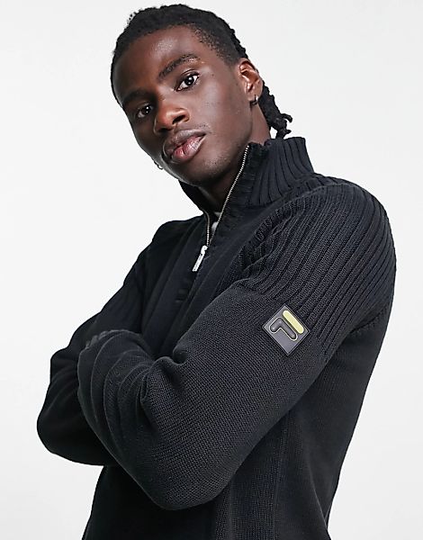 Fila – Gold – Gestricktes Sweatshirt in Schwarz mit kurzem Reißverschluss-W günstig online kaufen