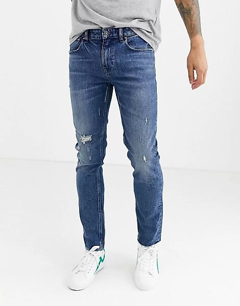 ASOS DESIGN – Cone Mill American Classic – Enge Jeans in mittelblauer Wasch günstig online kaufen