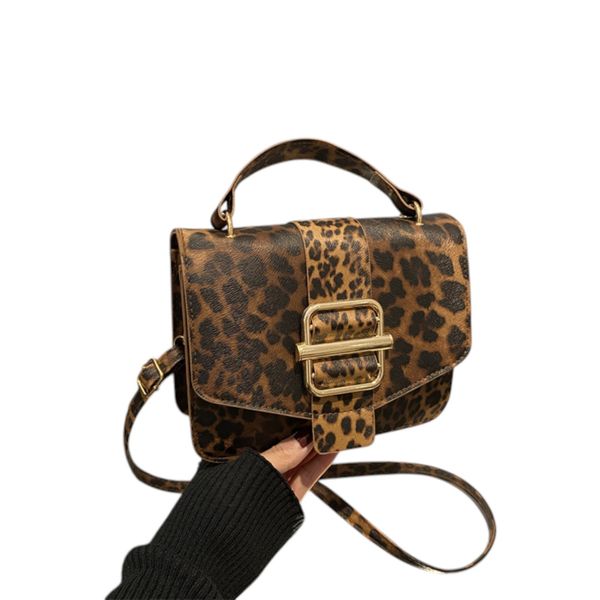 Eyecatcher Handtasche Glamour Leoparden-Handtasche mit goldener günstig online kaufen