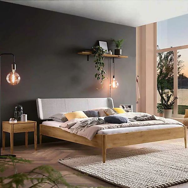 Wildeiche massiv Doppelbett in modernem Design mit Polsterkopfteil in Grau günstig online kaufen