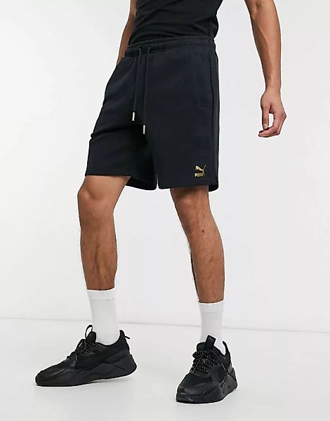 Puma – TFS Unity – Schwarze Shorts mit Logo in Metallic günstig online kaufen