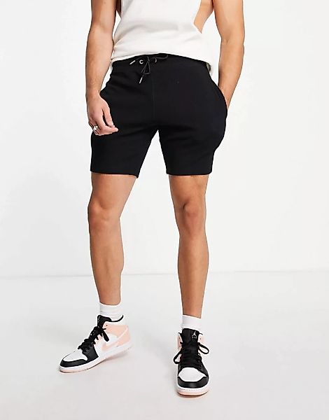 ASOS DESIGN – Eng geschnittene Shorts mit Waffelstruktur in Schwarz, Kombit günstig online kaufen