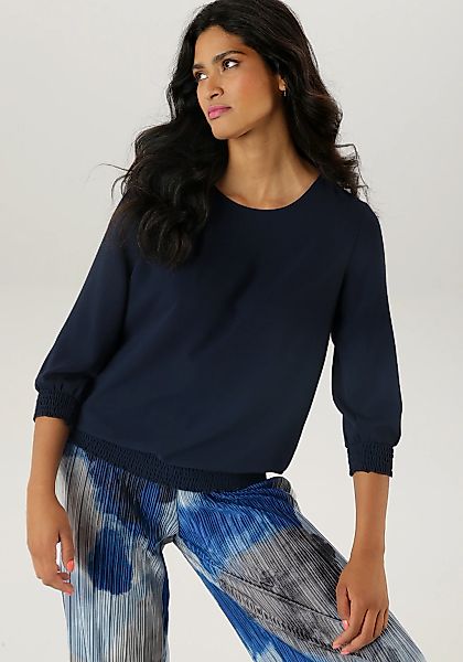 Aniston SELECTED Schlupfbluse, mit Smokbündchen und allover Blumenmuster günstig online kaufen